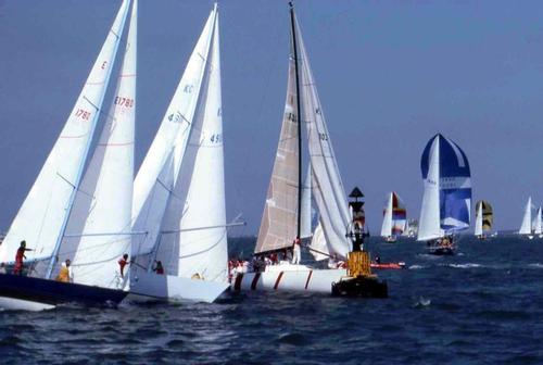 Problems continue for Hitchhiker as she waits for the starboard lane to clear before she can tack and round the mark, Potitos comes in overlapped with Pachena (CAN) © RB Sailing rbsailing.blogspot.ca